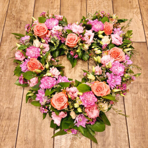 Funeral flowers mixed open heart Golden Flowers